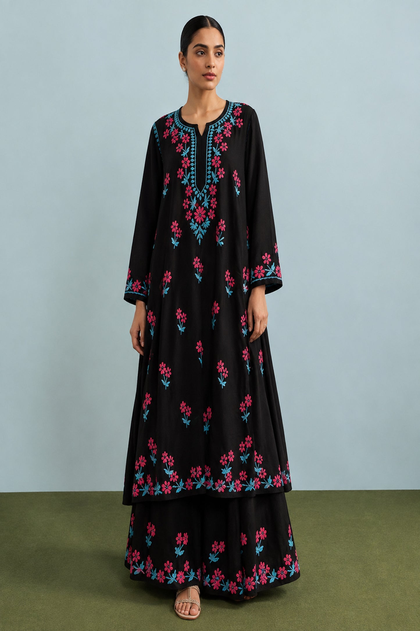 "Dark elegance meets vibrant floral details."