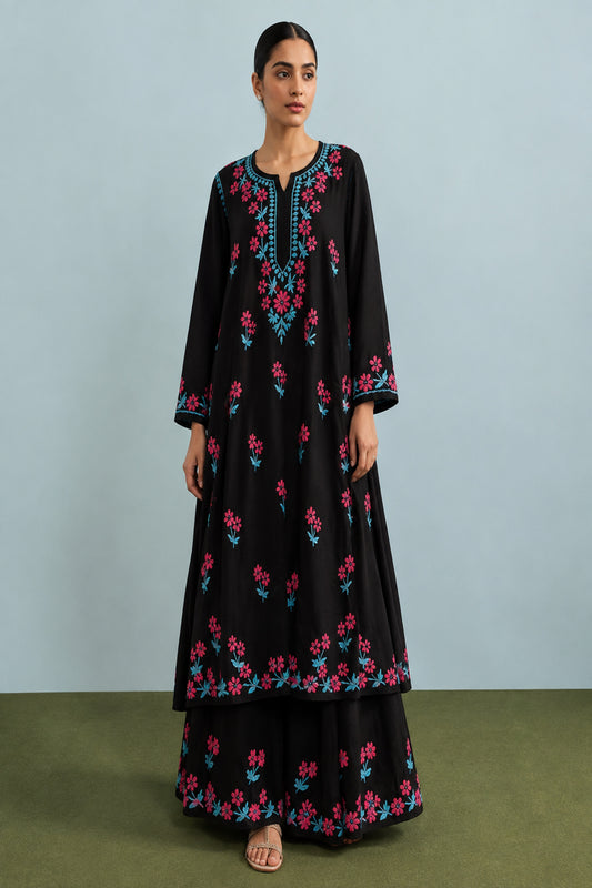"Dark elegance meets vibrant floral details."
